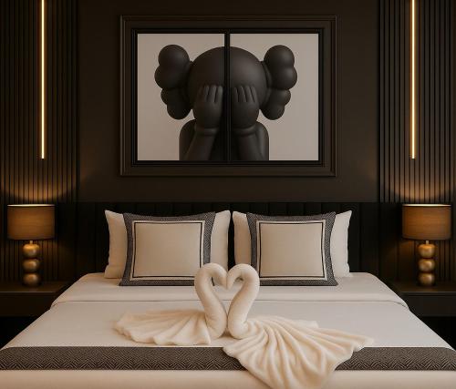 a bedroom with a bed with two hearts on it at 5 Star High Rise Luxury Apartment, Infinity Pool With Stunning Burj View - Brand New Apartment in Dubai