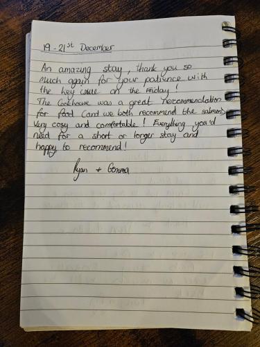 een notitieboekje met handschrift erin bij Vale View Apartment, Prestatyn, North Wales - a stylish, dog-friendly holiday let just a 5 min walk to beach & town! in Prestatyn