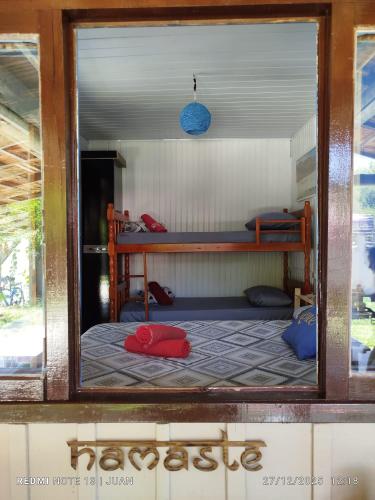 En eller flere senge i et værelse på Cabanas LA CASITA BRISA DO MAR