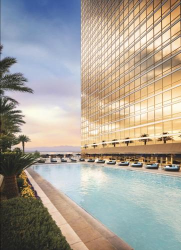 a rendering of a hotel with a swimming pool and a building at Trump International Condo Hotel in Las Vegas