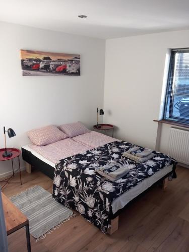 Säng eller sängar i ett rum på Leons House