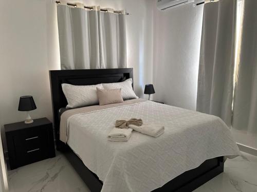 Giường trong phòng chung tại Vista Hermosa IV