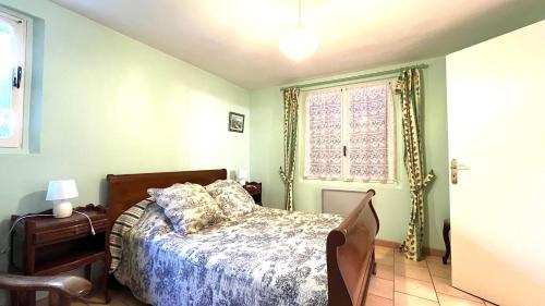 En eller flere senge i et værelse på Ma Vie La