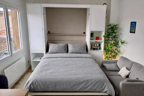 Katil atau katil-katil dalam bilik di Studio Trinité - Quartier des Carmes