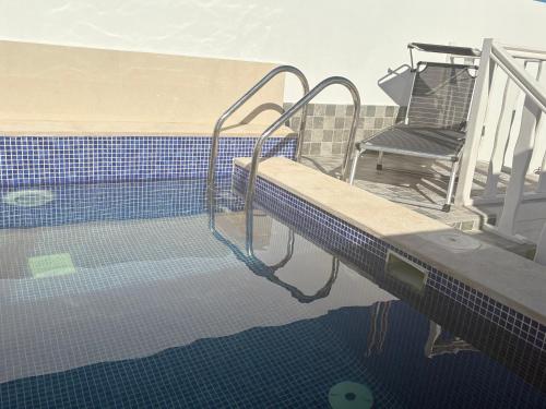 Bazén v ubytování Perle de sable nebo v jeho okolí