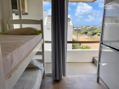 Giường trong phòng chung tại Les Diablettes