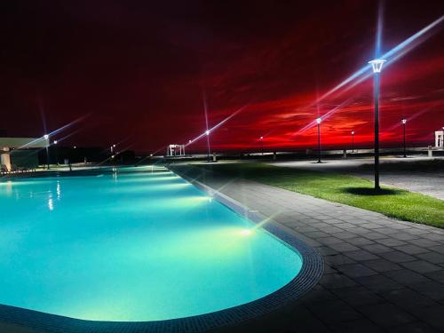 Swimmingpoolen hos eller tæt på Chincha CasaLed y jacuzzis sol todo el año