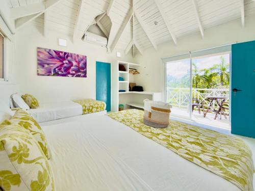 Postel nebo postele na pokoji v ubytování Casa Frente al Mar San Andrés Piscina Privada