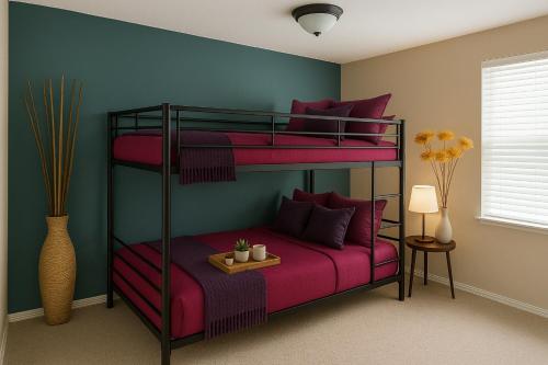 1 Schlafzimmer mit 2 Etagenbetten mit rosa Bettwäsche in der Unterkunft Crew Stay Sleeps 16 Work, Cook, Play & Relax in Navo