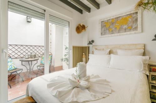 Giường trong phòng chung tại Casita Santa Bárbara - Alicante