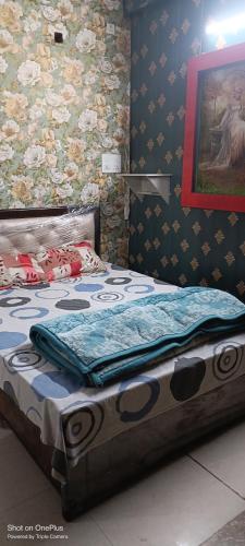 Giường trong phòng chung tại Shakti HomeStay - Kashi Dham