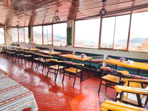 En restaurant eller et andet spisested på SQ Estancia Del Inca