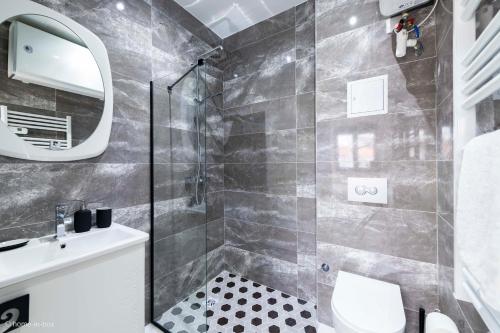 Et badeværelse på Moderne Studio proche ORLY- Paris