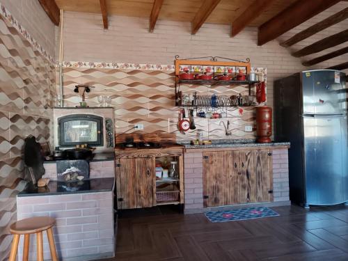 Een keuken of kitchenette bij Rancho Pedacinho de Coração