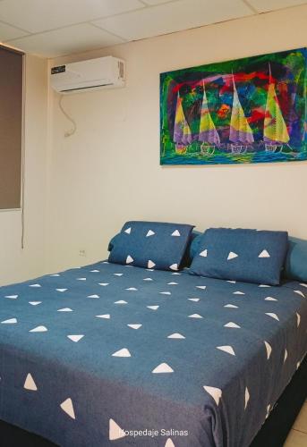 Llit o llits en una habitació de Riveri Salinas V53