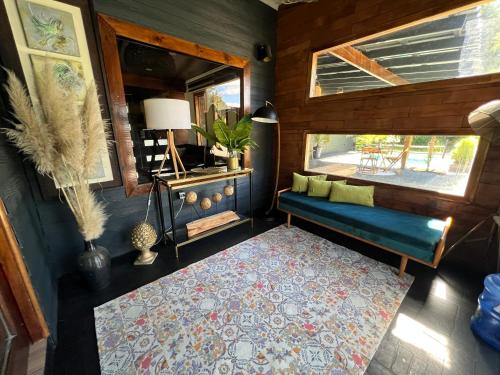 Posezení v ubytování Casa con 2 Piscinas y Cama elástica