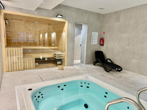 Et badeværelse på Rezydencja Niechorze 324 z Basenem, Sauną, Jacuzzi, przy samej PLAŻY - 5D Apartments - 5D Apartamenty