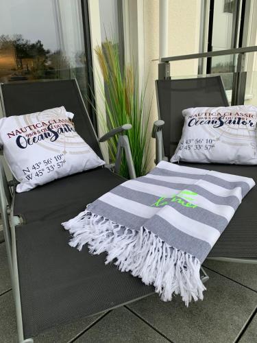 Stylische FeWo direkt am Strand mit Balkon und saisonalem Strandkorb photo 14