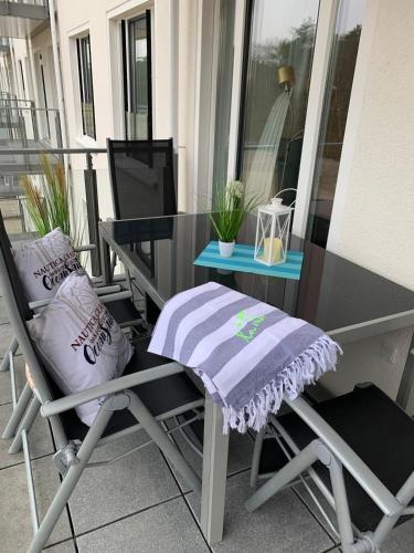 Stylische FeWo direkt am Strand mit Balkon und saisonalem Strandkorb photo 21