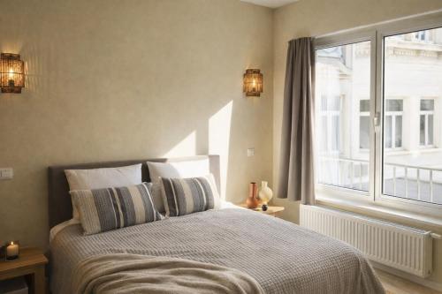Postel nebo postele na pokoji v ubytování Japandi Lofts - 2 Bedrooms at old city of Antwerp