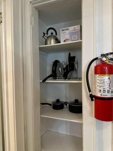 a fire hydrant sitting inside of a kitchen pantry at Charming 2-bedroom apartment with Washer and Dryer in Jersey City in Jersey City