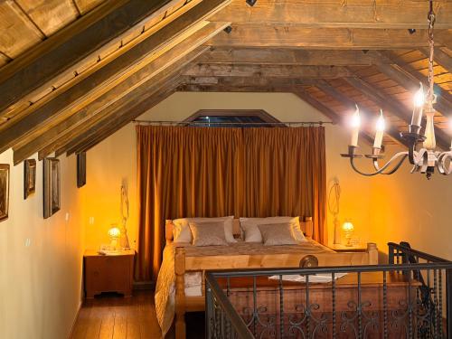 a bedroom with a large bed in a room at A-Termal Palić in Palić