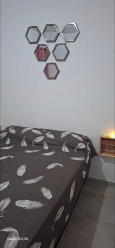 En eller flere senge i et værelse på DEPARTAMENTO a ESTRENAR - TUCUMAN