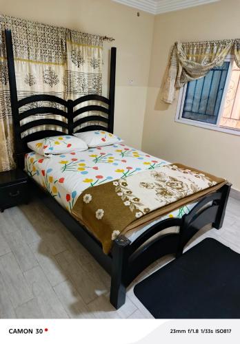 Llit o llits en una habitació de DEEN HOLIDAY ap