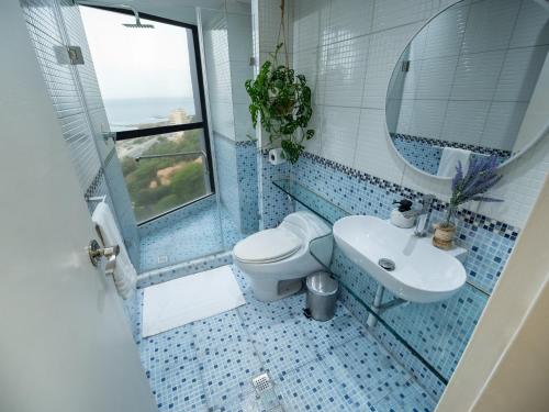 Koupelna v ubytování Beach front 9 min to airport DosLocosDeViaje