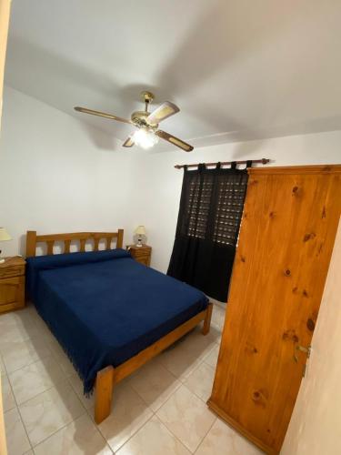 En eller flere senge i et værelse på Las3casitasdesalvador