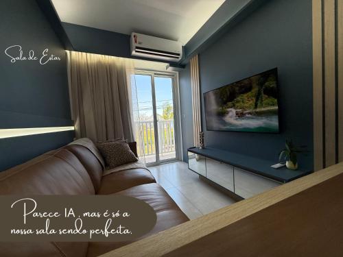 TV/trung tâm giải trí tại Beira-Mar Sofisticado com Vista Mar e Piscina 02