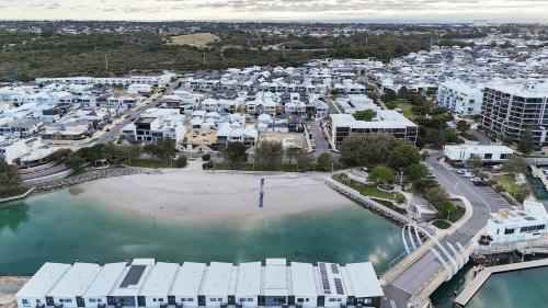 an aerial view of a city with a body of water at Maraboo Island - Luxury, Beachfront, family friendly, Sauna, close to Fremantle & Rottnest Island Ferry in Coogee