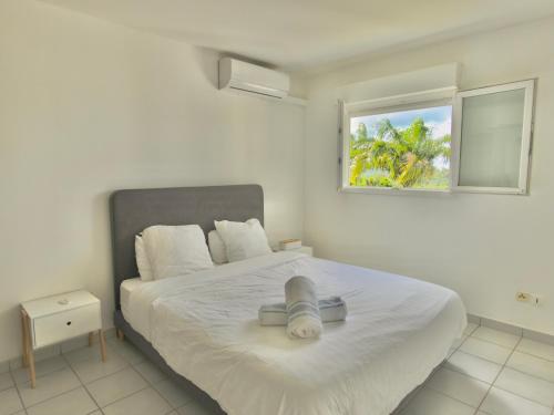 Giường trong phòng chung tại Appartement T2 Chic - vue mer et montagne