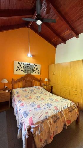 En eller flere senge i et værelse på Ariel Reynoso - Departamento Planta Baja