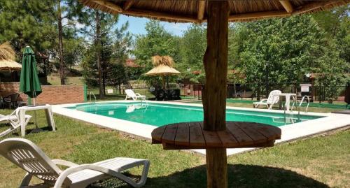 Swimmingpoolen hos eller tæt på Cabañas encantado