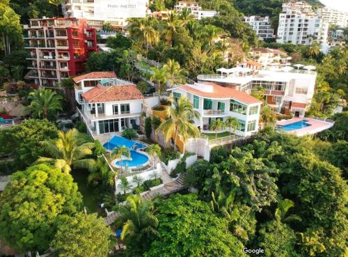an aerial view of a house in a city at Hillside Villa with ocean views in Puerto Vallarta
