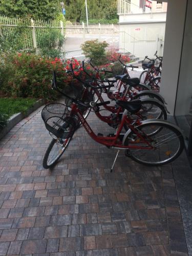 a group of bikes parked next to a building at Hotel Vischi in Domaso