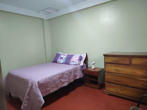 Giường trong phòng chung tại Posada del Carmen