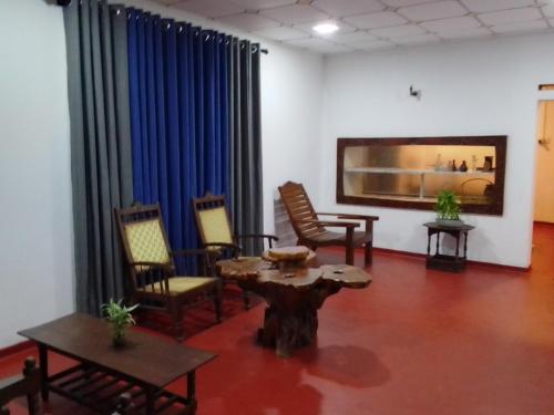 Et opholdsområde på Dimuthu Cottage Hiriketiya