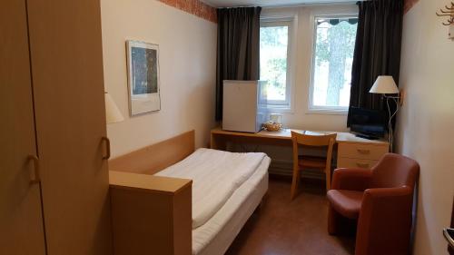 Postel nebo postele na pokoji v ubytování Hotell Sport & Rest