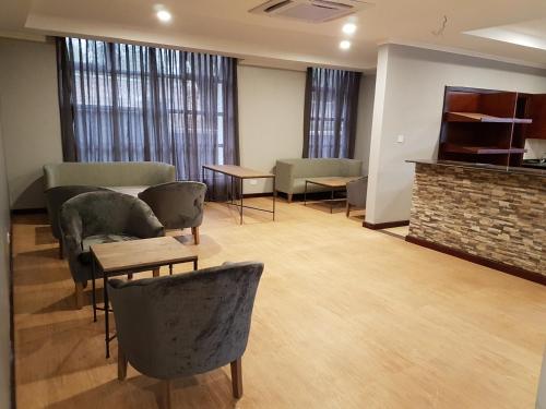 Posezení v ubytování Kilimanjaro Wonders Hotel
