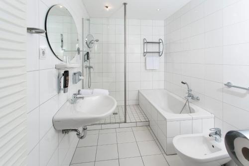 Koupelna v ubytování Hanse Hotel