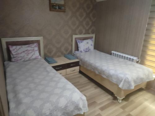 Llit o llits en una habitació de FF Motel