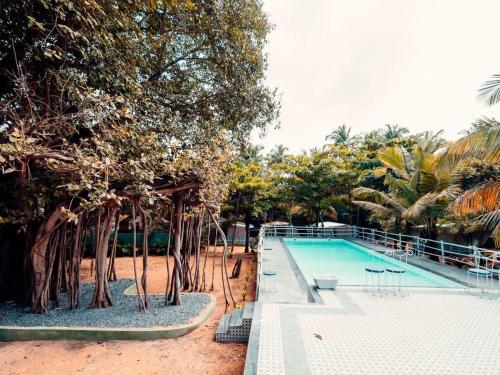 Bazén v ubytování Hotel Moana Cottage Goa Near Sea Beach with Swimming pool -Free Wifi -Parking -Room Service -Best Hotel In Goa nebo v jeho okolí