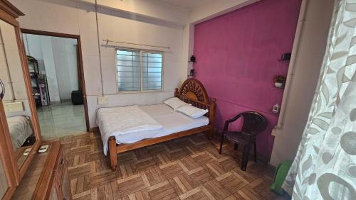 Giường trong phòng chung tại Amee's Luxury above the City