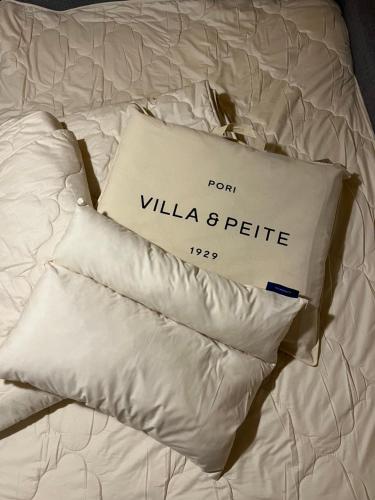 Giường trong phòng chung tại Savonniemen loma-asunto