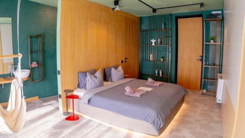 Giường trong phòng chung tại Amuse Bouche by Skabrin