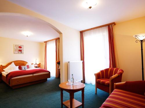 Ένα ή περισσότερα κρεβάτια σε δωμάτιο στο Landhotel Mohren