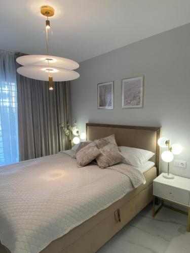 Giường trong phòng chung tại Flamenca Village- Apartment Fabiola