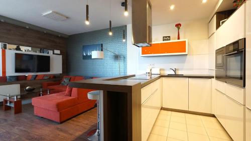 Kuchyň nebo kuchyňský kout v ubytování Galerius Golden Beach Apartment